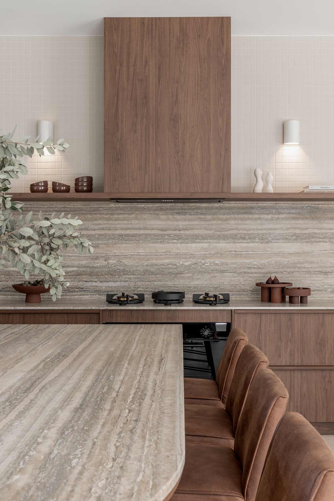 A-mid-century-modern-inspired-kitchen-with-timber-cabinetry-and-a-breakfast-bench