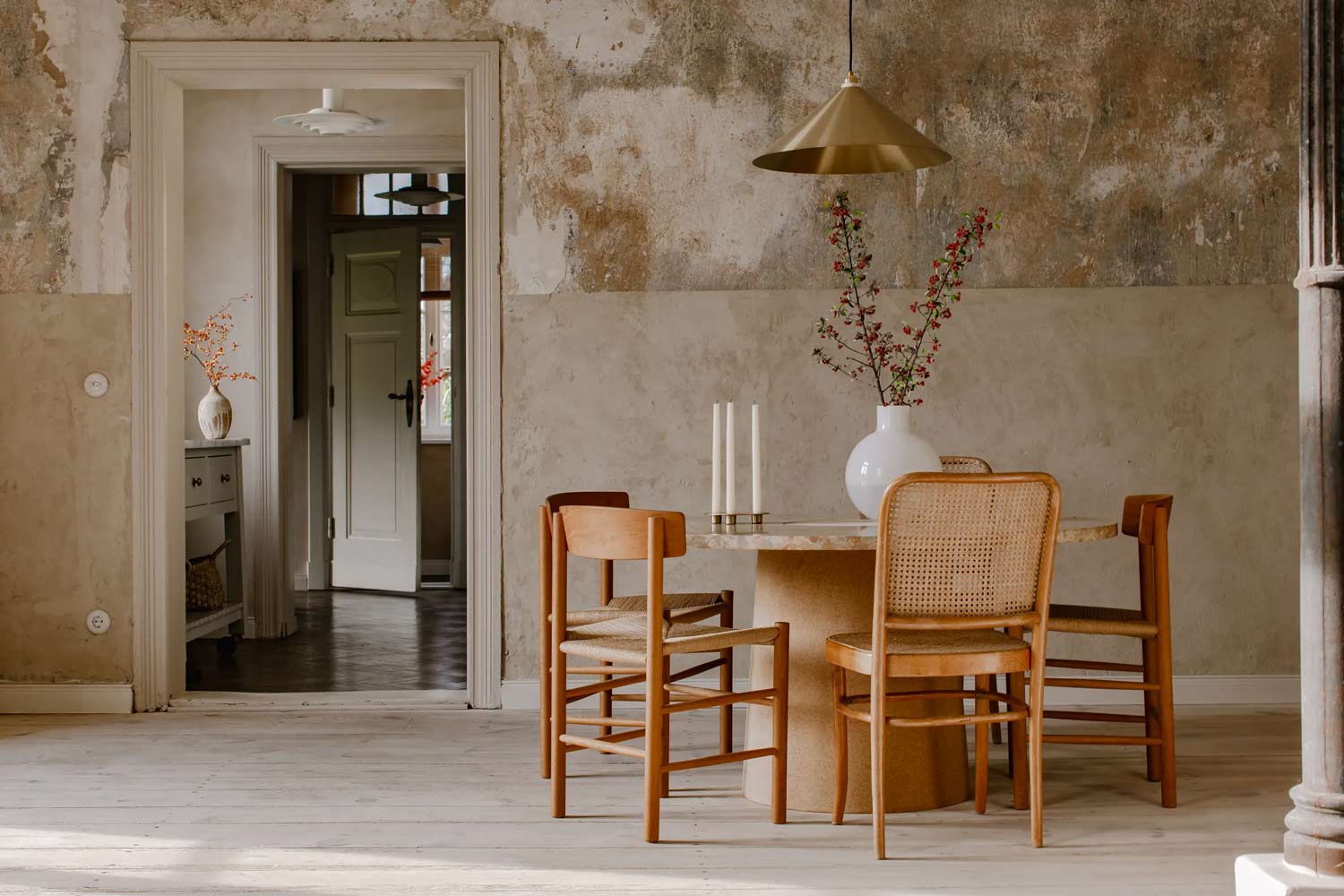 A wabi sabi inspired kitchen and dining room with a natural colour palette and textured walls