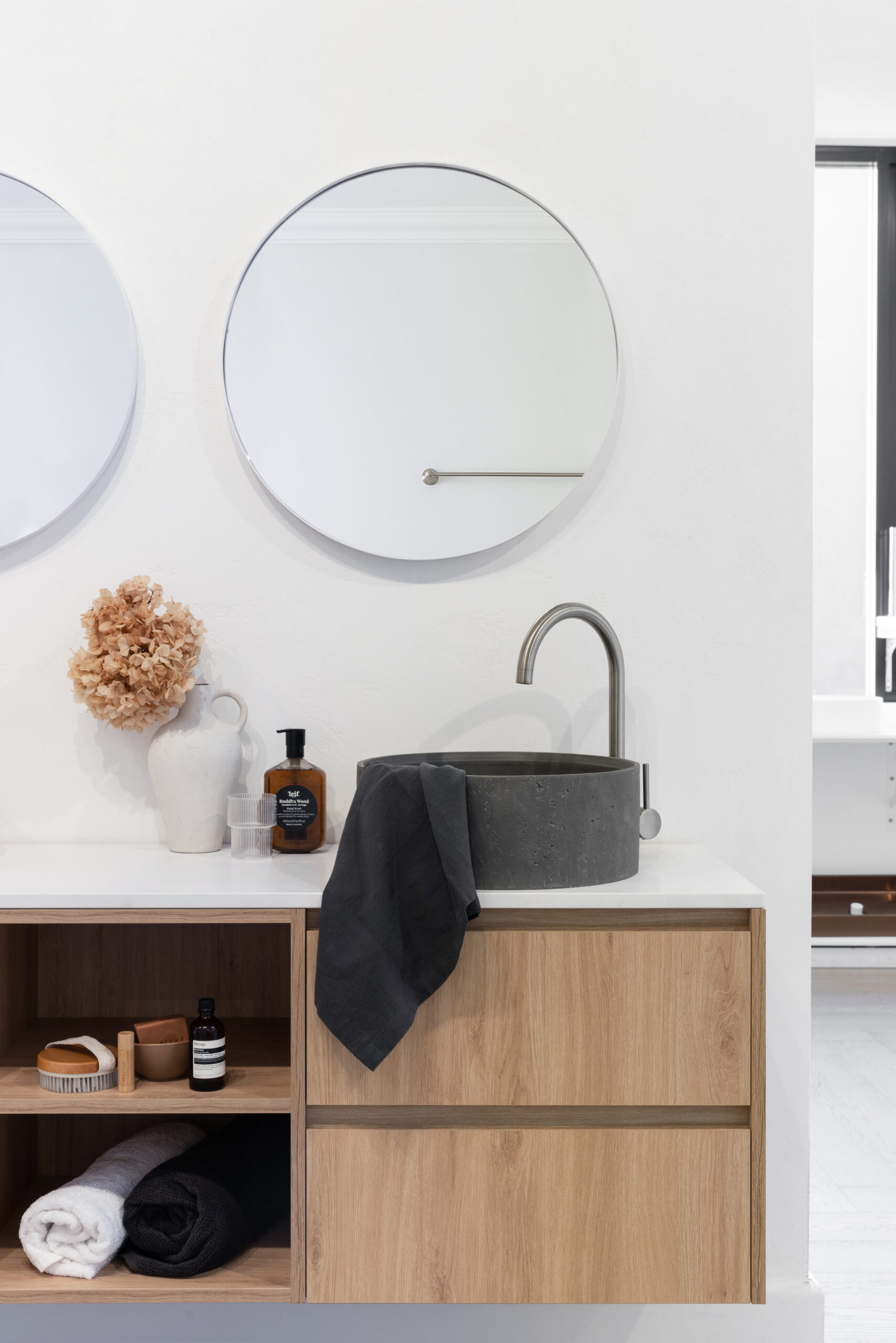 Adding-texture-and-colour-to-your-bathroom-with-a-concrete-above-counter-basin-round-scaled