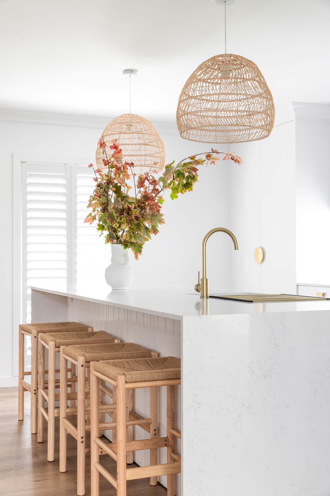 Calm Coastal simple look for refurbishing a kitchen brushed brass tapware and cabinetry pulls