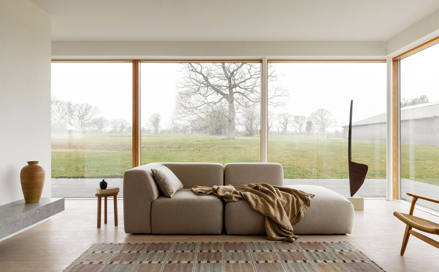 Minimal interior design and asymmetry for a wabi sabi inspired pavilion house in the UK