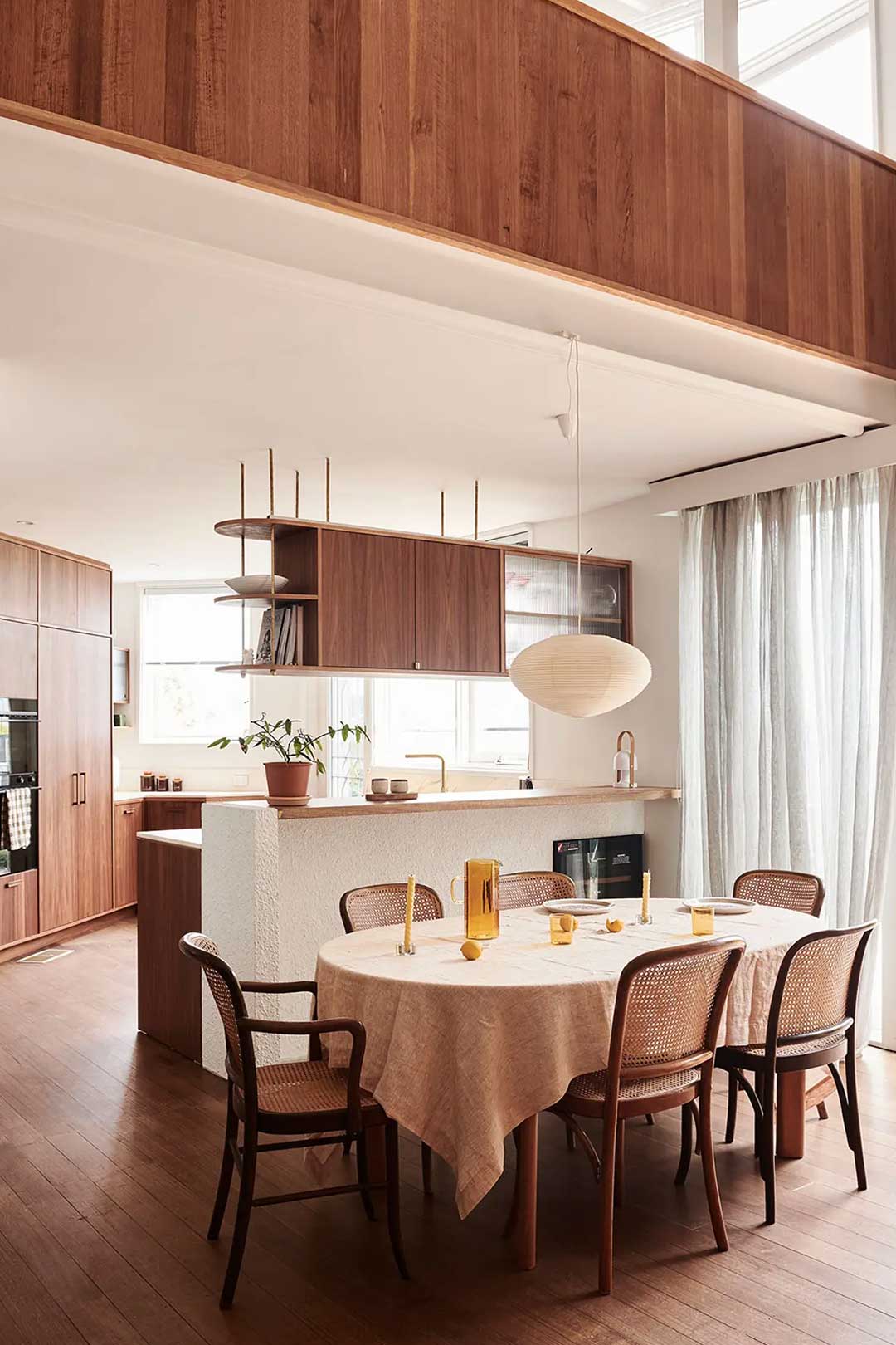 Open shelving and a vintage look mid centruy modern dining table