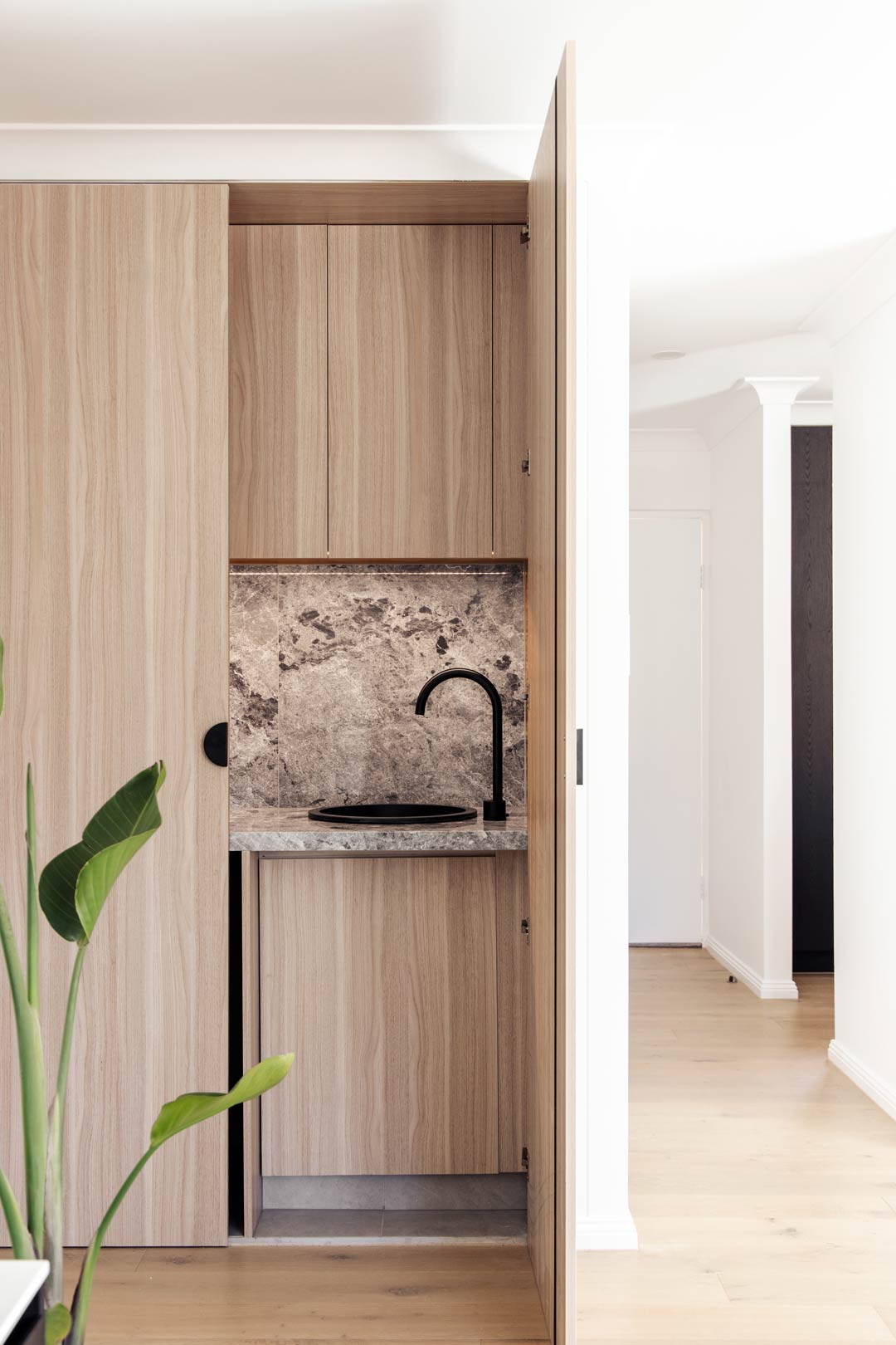 Space-saving-small-laundry-ideas-tucking-your-compact-laundry-in-a-hallway-cupboard-1